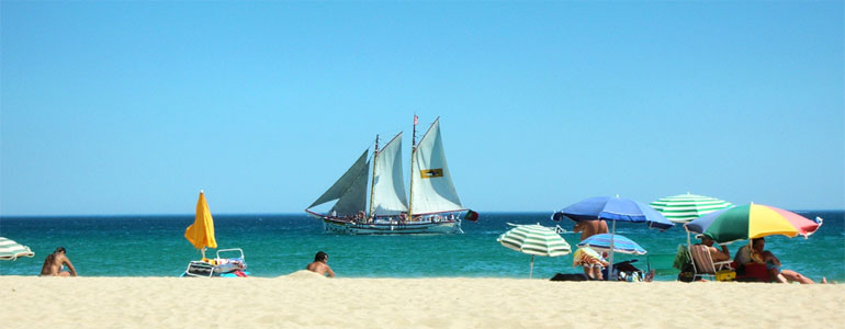 Large yacht viewed from beach